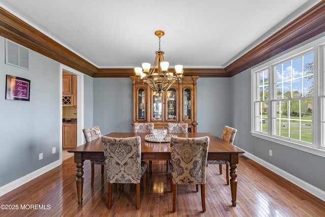 5 Breckenridge Ct, Freehold, NJ 07728 - dining room featuring an inviting chandelier, ornamental molding, baseboards, and visible vents