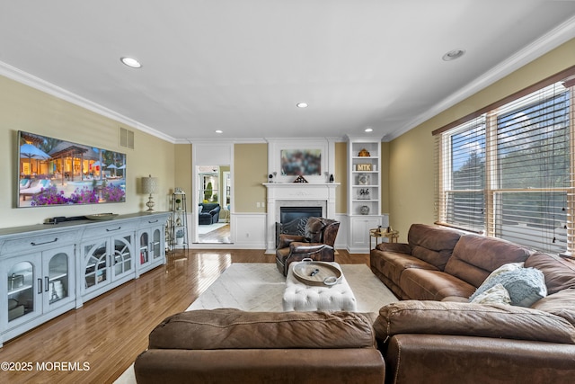 5 Breckenridge Ct, Freehold, NJ 07728 - living room with ornamental molding, a wealth of natural light, visible vents, and wood finished floors