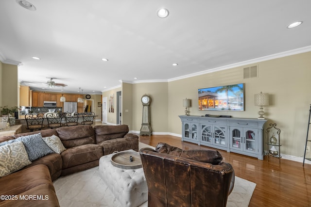 5 Breckenridge Ct, Freehold, NJ 07728 - living area featuring baseboards, recessed lighting, ornamental molding, and visible vents