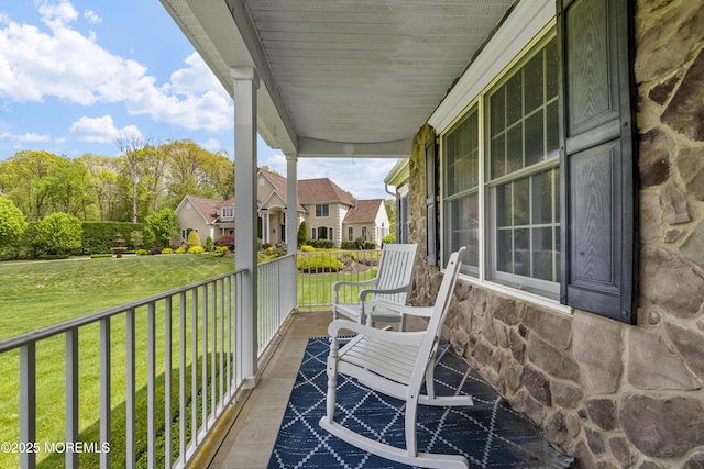 5 Breckenridge Ct, Freehold, NJ 07728 - balcony featuring covered porch and a residential view