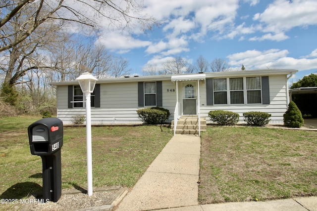 view of front of home featuring a front yard