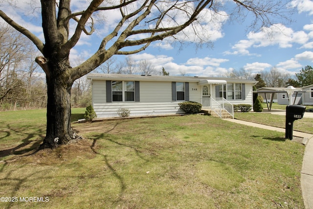 ranch-style home with a front yard