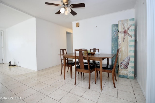 dining space with ceiling fan and light tile patterned floors