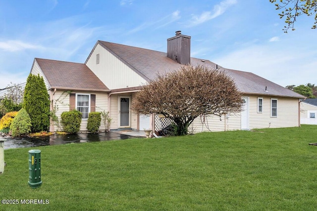 44 Buckingham Dr N, Manchester, NJ 08759 - view of front of property with a front lawn and a chimney
