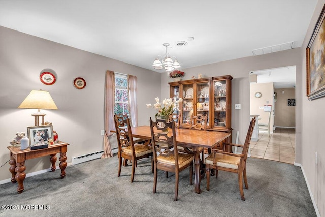 44 Buckingham Dr N, Manchester, NJ 08759 - carpeted dining room with baseboard heating, a chandelier, baseboards, and visible vents