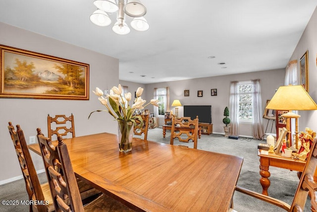 44 Buckingham Dr N, Manchester, NJ 08759 - dining area with baseboards, carpet flooring, and an inviting chandelier