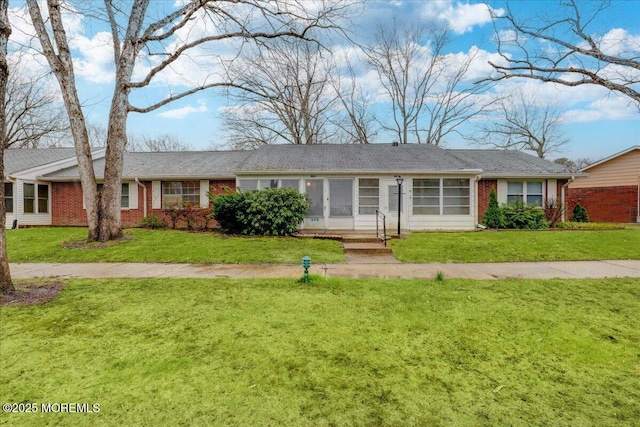 86E Dorchester Dr, Lakewood, NJ 08701 - ranch-style home featuring brick siding and a front lawn