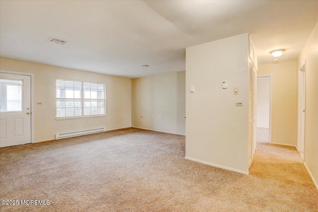 86E Dorchester Dr, Lakewood, NJ 08701 - empty room featuring baseboard heating, light carpet, baseboards, and visible vents