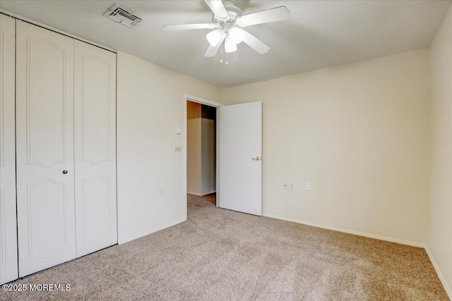 86E Dorchester Dr, Lakewood, NJ 08701 - unfurnished bedroom with baseboards, a closet, carpet flooring, a ceiling fan, and visible vents