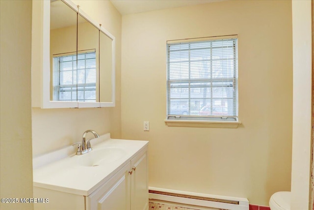 86E Dorchester Dr, Lakewood, NJ 08701 - half bathroom with vanity, a baseboard radiator, and toilet