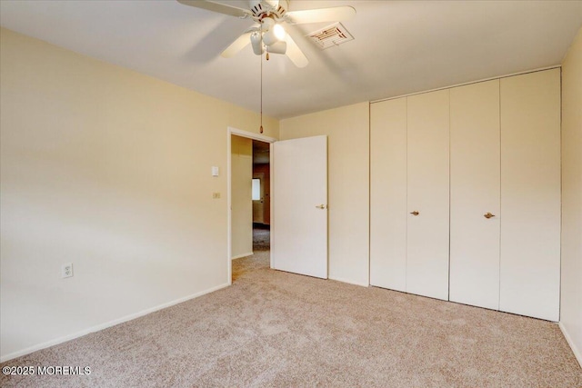 86E Dorchester Dr, Lakewood, NJ 08701 - unfurnished bedroom featuring visible vents, ceiling fan, carpet flooring, and a closet