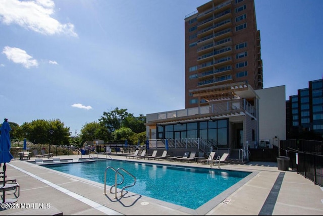 28 Riverside Ave Unit 4H, Red Bank, NJ 07701 - pool featuring fence and a patio