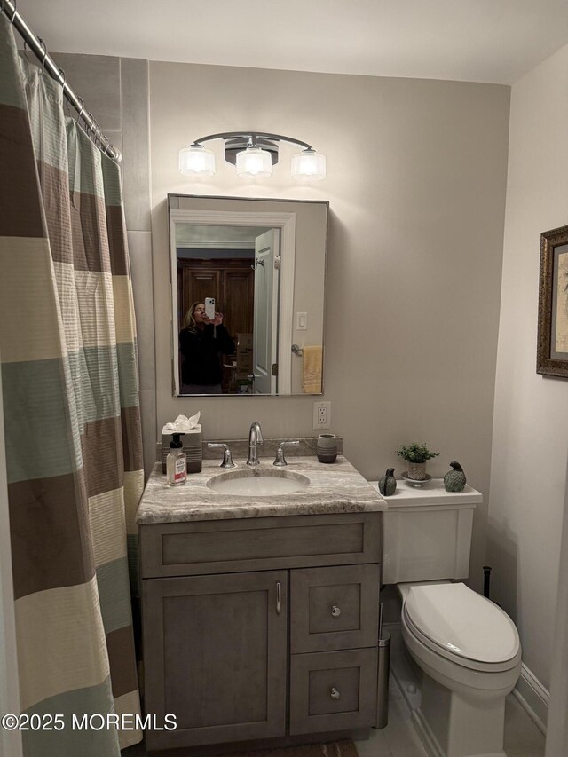 28 Riverside Ave Unit 4H, Red Bank, NJ 07701 - full bath with vanity, a shower with shower curtain, tile patterned floors, and toilet
