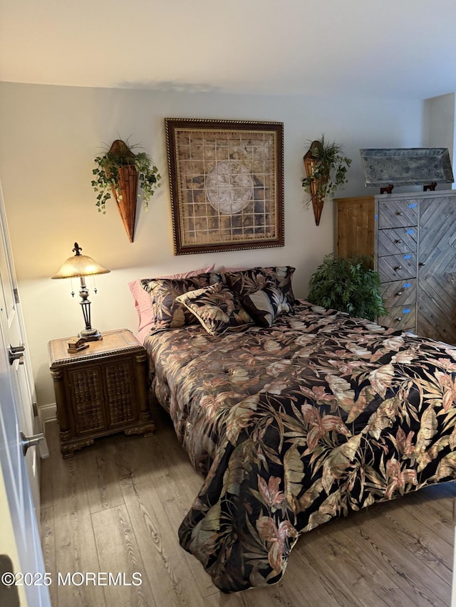 28 Riverside Ave Unit 4H, Red Bank, NJ 07701 - bedroom featuring wood finished floors