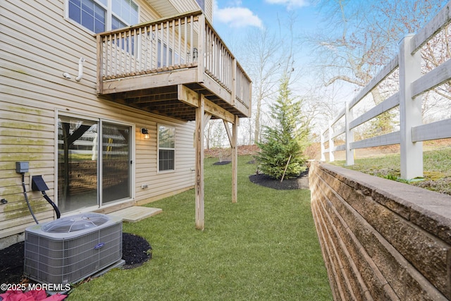 view of yard featuring a wooden deck and cooling unit
