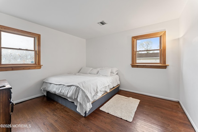 71 6th St, Belford, NJ 07718 - bedroom with visible vents, hardwood / wood-style flooring, and baseboards