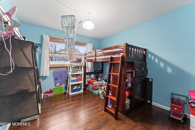 71 6th St, Belford, NJ 07718 - bedroom with baseboards and wood finished floors