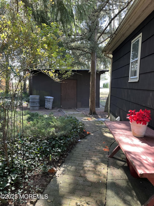 view of patio / terrace with an outdoor structure