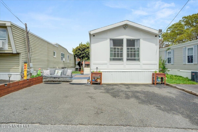 exterior space with a patio and an outdoor living space