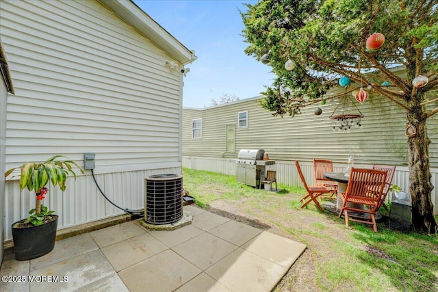 view of patio featuring central AC and area for grilling
