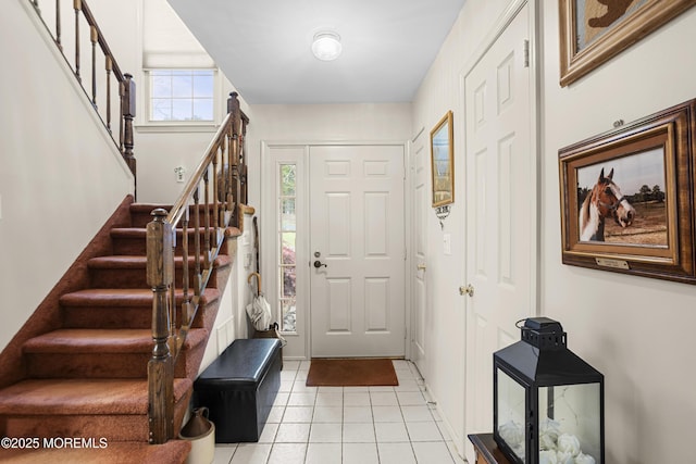 55 Marc Dr, Howell, NJ 07731 - foyer entrance with stairs and light tile patterned flooring