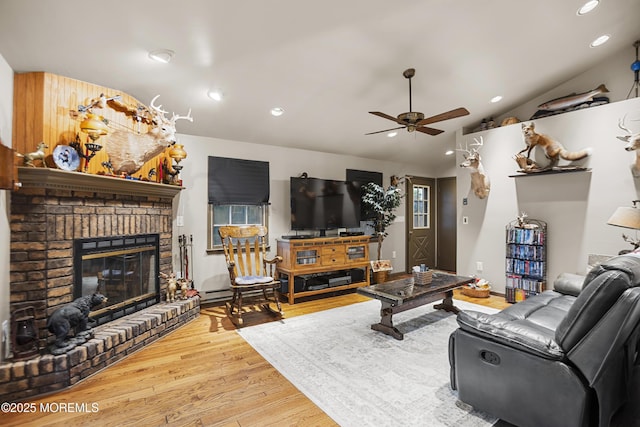 55 Marc Dr, Howell, NJ 07731 - living room with ceiling fan, wood finished floors, a brick fireplace, recessed lighting, and vaulted ceiling