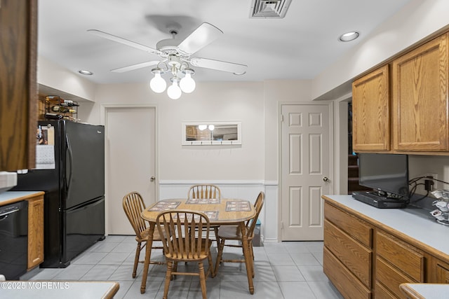 55 Marc Dr, Howell, NJ 07731 - dining room with ceiling fan, light tile patterned floors, and a wainscoted wall