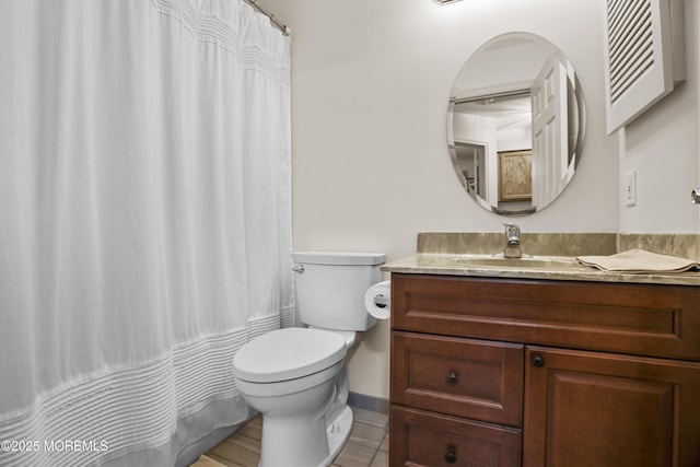 55 Marc Dr, Howell, NJ 07731 - bathroom featuring toilet, vanity, tile patterned floors, and a shower with shower curtain
