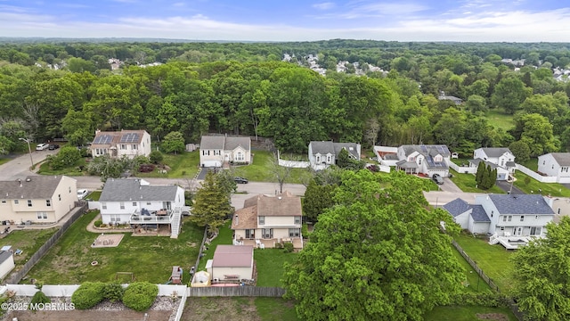 55 Marc Dr, Howell, NJ 07731 - aerial perspective of suburban area with a heavily wooded area
