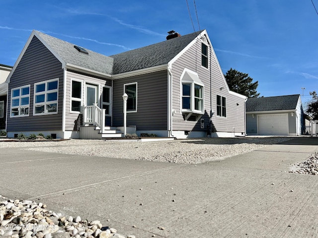 127 8th Ave, Seaside Park, NJ 08752 - bungalow-style home with a garage, a shingled roof, driveway, and a chimney