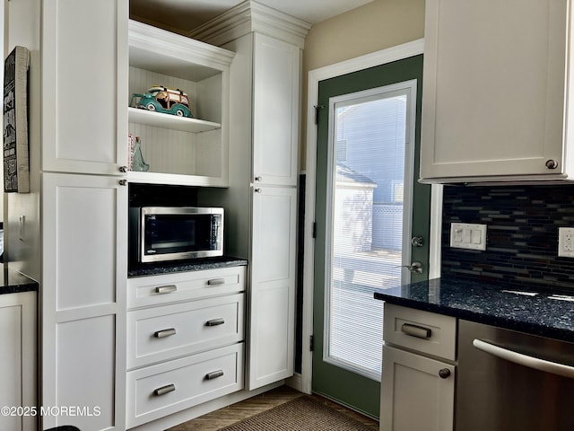 127 8th Ave, Seaside Park, NJ 08752 - kitchen with appliances with stainless steel finishes, backsplash, open shelves, white cabinets, and dark stone countertops