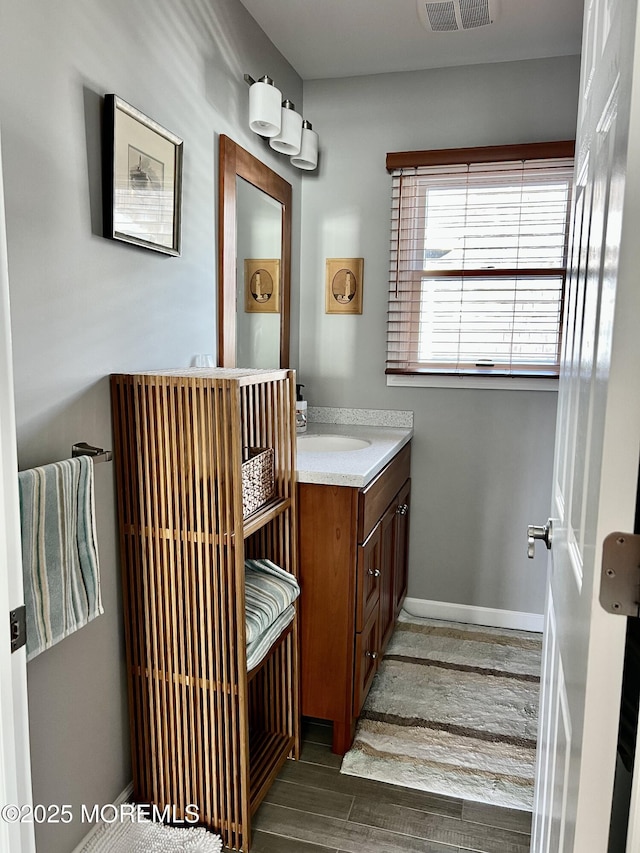 127 8th Ave, Seaside Park, NJ 08752 - bathroom featuring vanity and wood finished floors