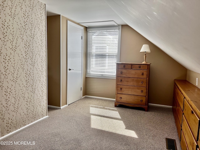 127 8th Ave, Seaside Park, NJ 08752 - carpeted bedroom with lofted ceiling and baseboards