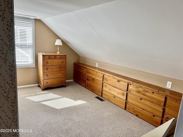 127 8th Ave, Seaside Park, NJ 08752 - additional living space with lofted ceiling, light carpet, and baseboards