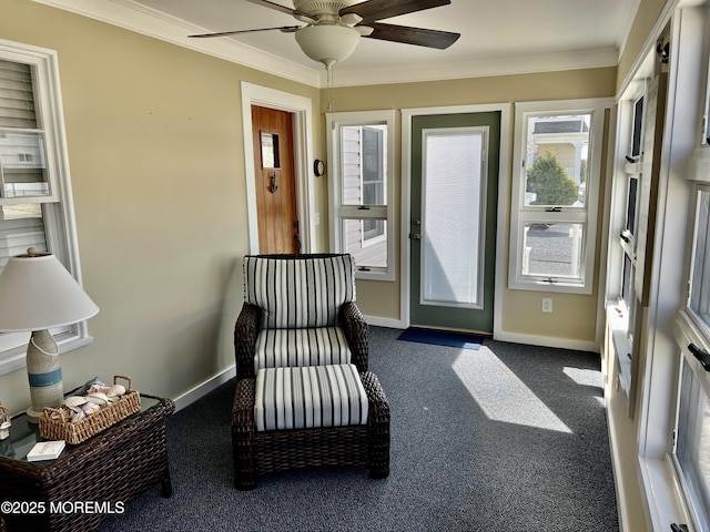 127 8th Ave, Seaside Park, NJ 08752 - living area featuring a ceiling fan, dark colored carpet, crown molding, and baseboards