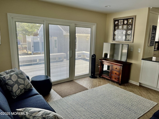 127 8th Ave, Seaside Park, NJ 08752 - living room with wood finished floors, baseboards, and recessed lighting