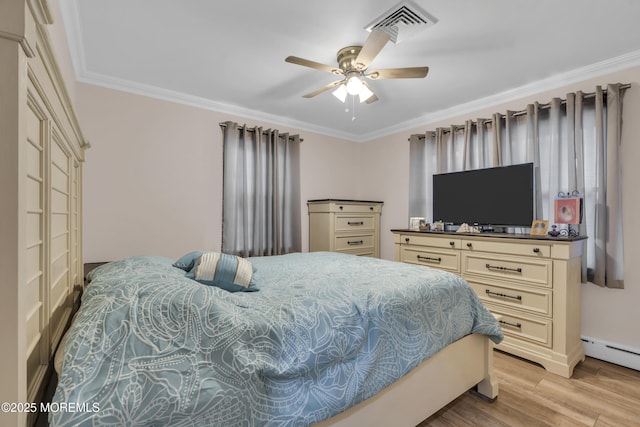 bedroom featuring ceiling fan, ornamental molding, visible vents, a baseboard radiator, and light wood finished floors