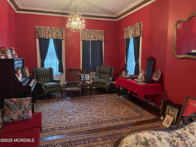 6056 Main St, Hamilton, NJ 08330 - living area with a notable chandelier, ornamental molding, and wood finished floors