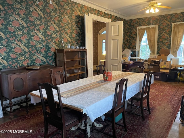 6056 Main St, Hamilton, NJ 08330 - dining area featuring ornamental molding, ceiling fan, and wallpapered walls