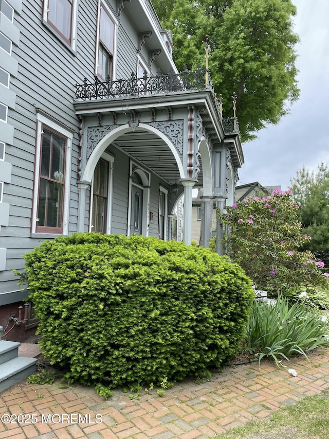 6056 Main St, Hamilton, NJ 08330 - view of side of home featuring a balcony