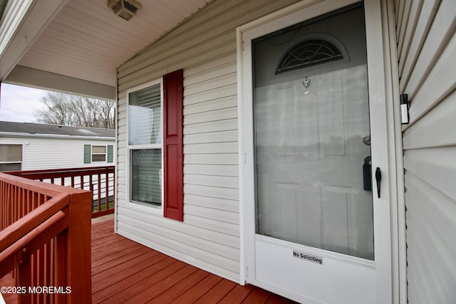 wooden deck featuring covered porch