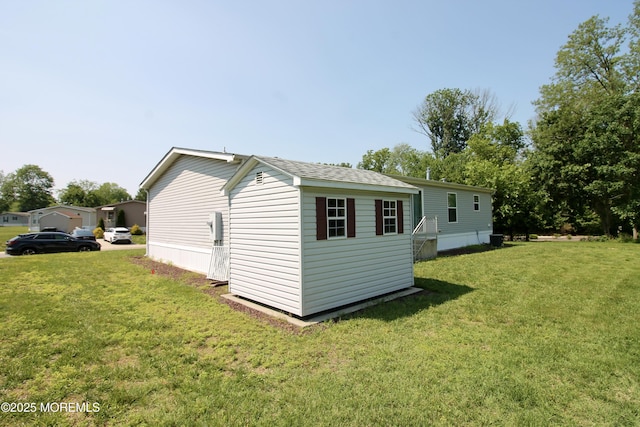 2 Brookside Way, Freehold, NJ 07728 - view of property exterior with a yard