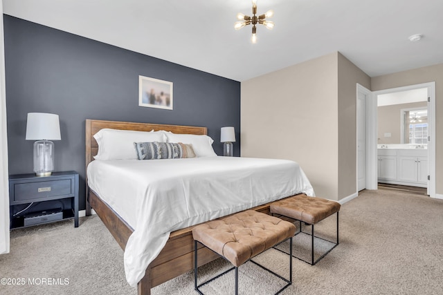 bedroom featuring carpet floors, a chandelier, and baseboards