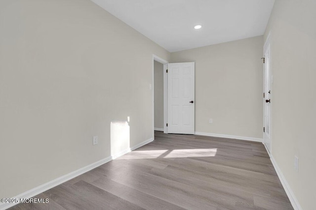 1396 Gleniffer Hill Rd, Toms River, NJ 08755 - empty room with baseboards, wood finished floors, and recessed lighting