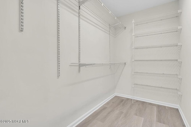 1396 Gleniffer Hill Rd, Toms River, NJ 08755 - walk in closet with wood finished floors