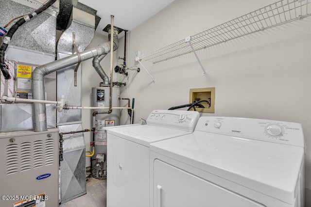 1396 Gleniffer Hill Rd, Toms River, NJ 08755 - washroom with water heater, heating unit, laundry area, wood finished floors, and washer and dryer