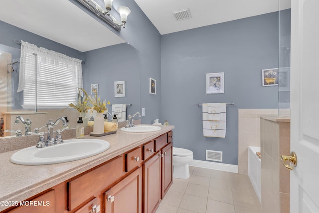 full bathroom featuring tile patterned floors, a sink, and visible vents