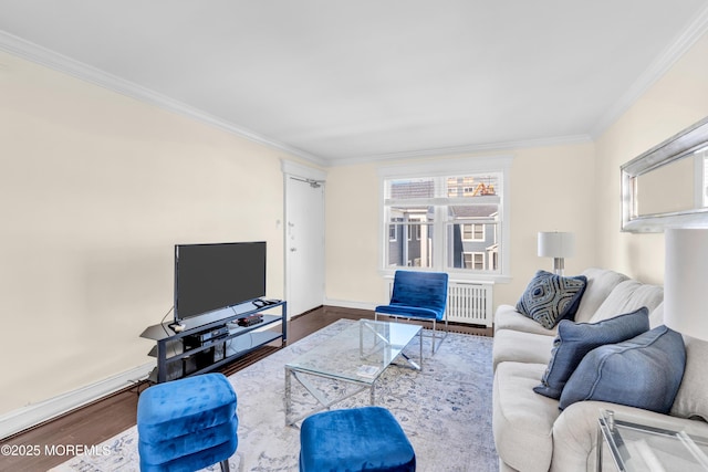 living room featuring crown molding, wood finished floors, and plenty of natural light