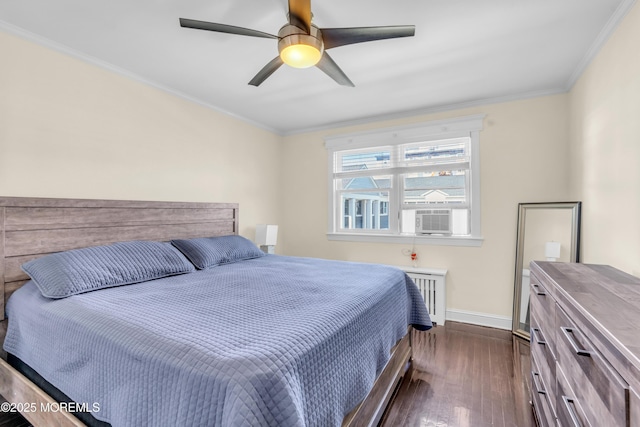 bedroom featuring radiator, dark wood-type flooring, cooling unit, ornamental molding, and baseboards