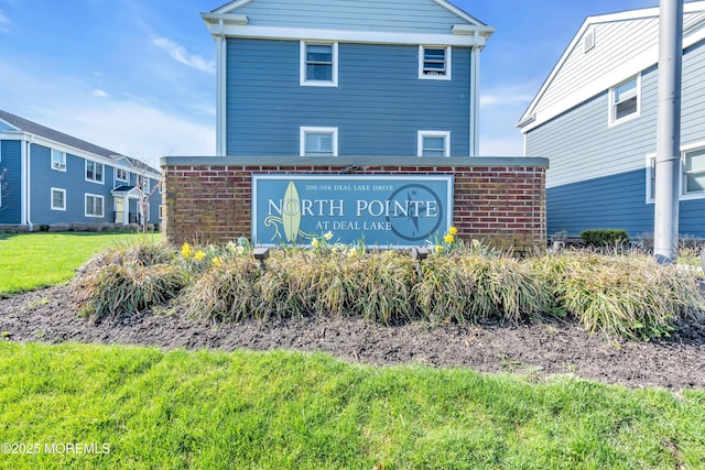 view of community sign